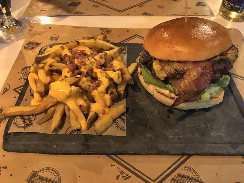 Loaded fries and a burger