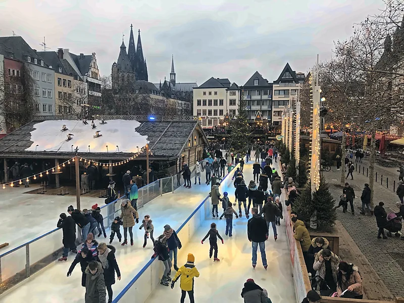 The Christmas market ice rink below the cathedral